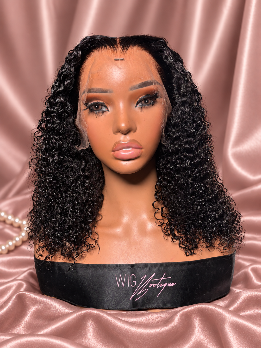 13x4 Curly Bob (On Hand), photo 1, on rose-champagne satin with ivory pearls
