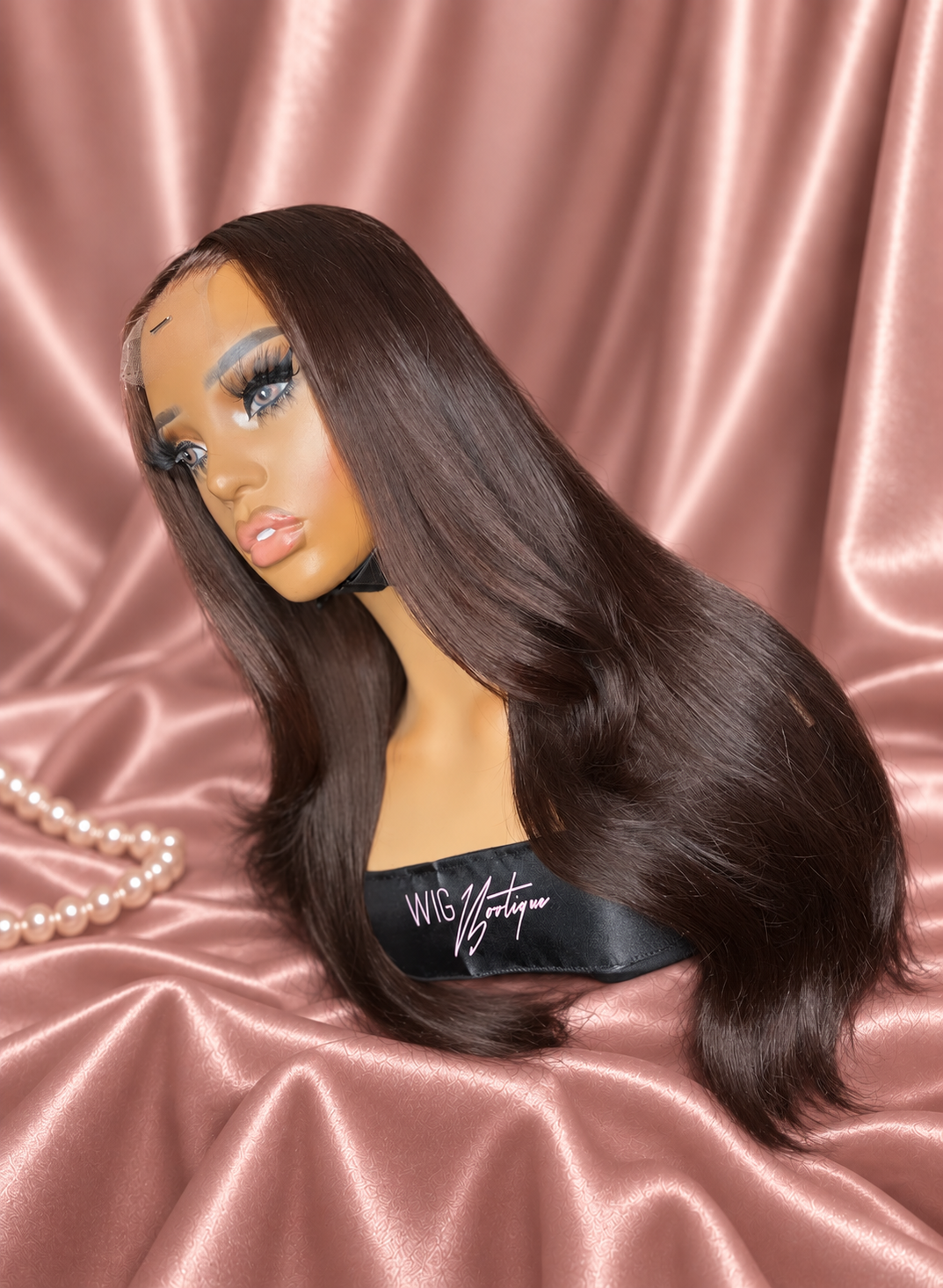 Trina chocolate brown wig on rose satin, view 3