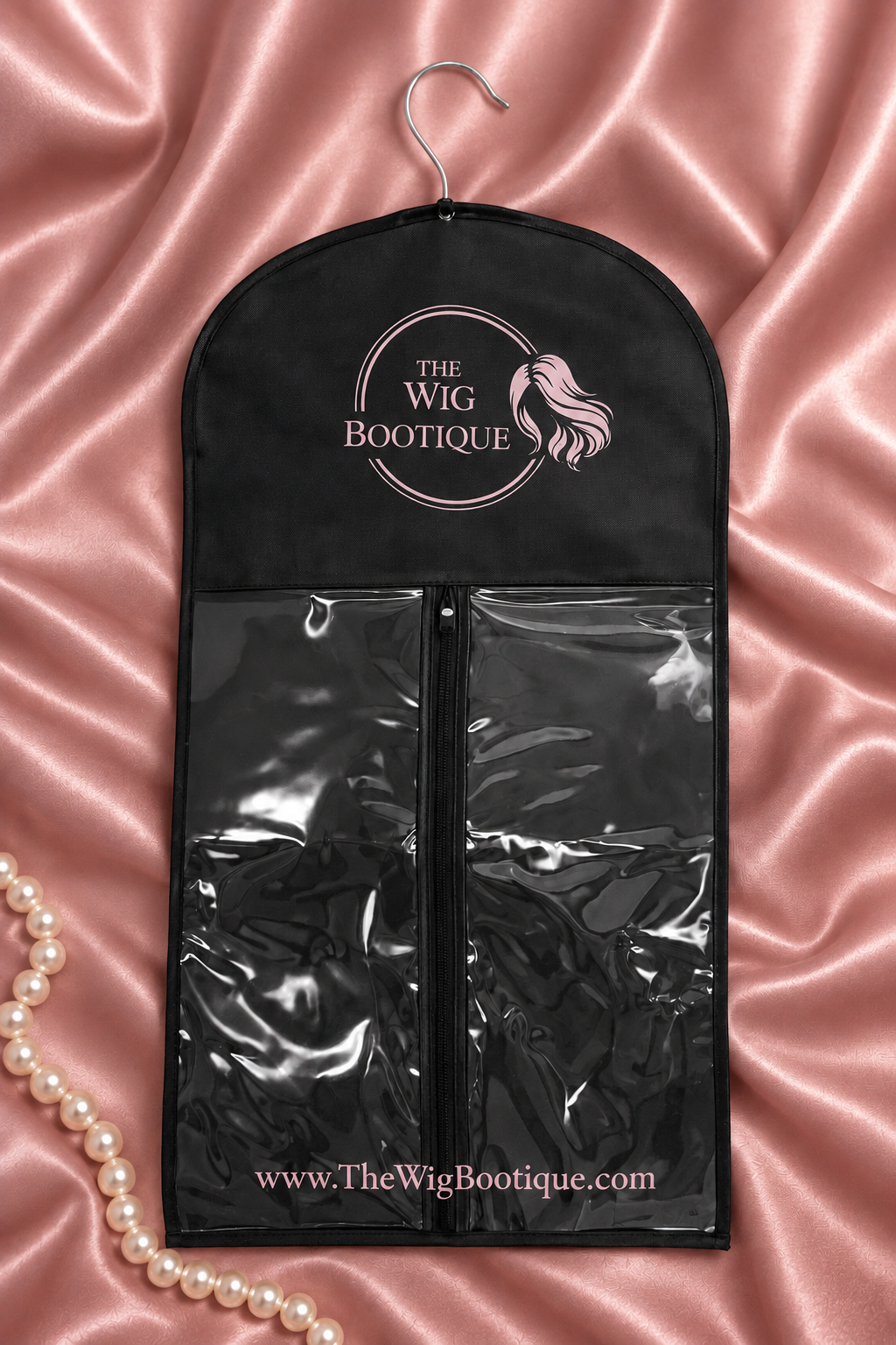 Black Wig Bootique storage bag with hanger on rose satin